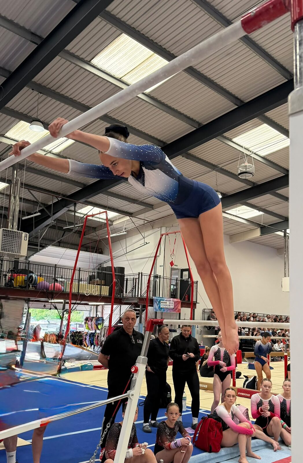 Maldon gymnast in a handstand on the bars